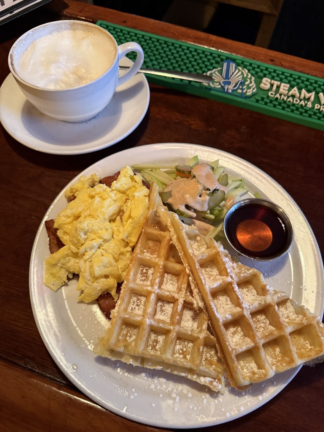 Authentic Brussels-style Belgian waffles with scrambled eggs and coffee at Petit Dejeuner Toronto