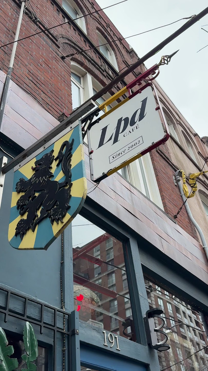 Petit Dejeuner brick storefront sign on King Street East
